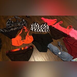 Swimsuits in different sizes (Med, Large, XLarge) different brands, mostly AERIE